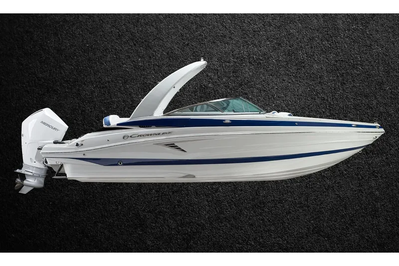The Image of 2026 Crownline 260 XSS boat on trailer, displayed outdoors with overcast sky. - 0