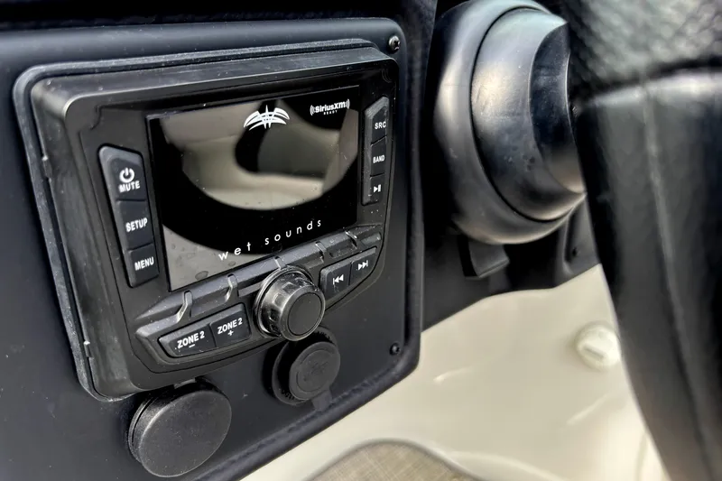 Slide: The Image of Close-up of audio control panel in 2026 Crownline 260 XSS boat. - 10