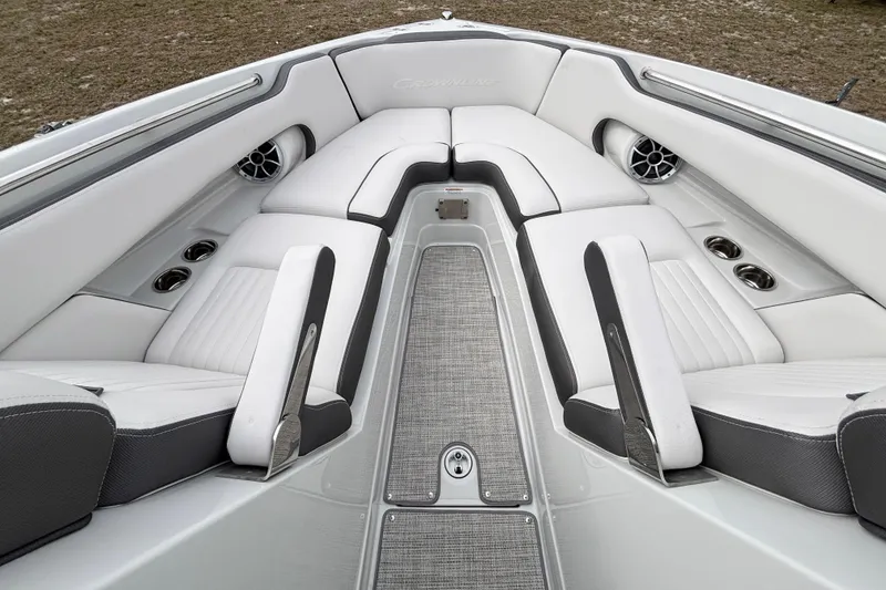 Slide: The Image of Luxurious interior of 2026 Crownline 260 XSS boat with plush seating and cup holders. - 25