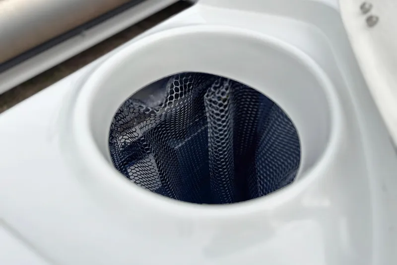 Slide: The Image of Cup holder with netting on 2026 Crownline 260 XSS boat. - 31