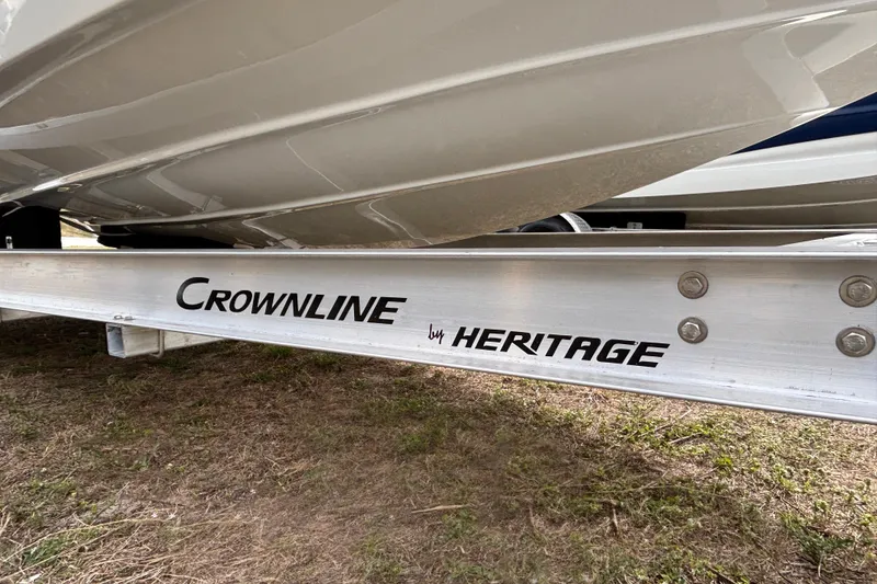 Slide: The Image of 2026 Crownline 260 XSS boat on Heritage trailer, side view. - 35