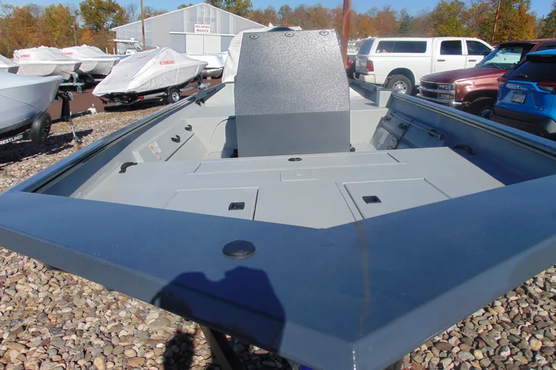 Slide: The Image of 2026 Crestliner 1870 Retriever FCC boat on display in outdoor showroom. - 12