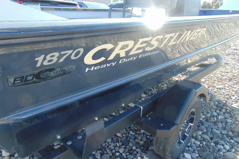 Slide: The Image of 2026 Crestliner 1870 Retriever FCC boat, Heavy Duty Edition, on a trailer. - 6