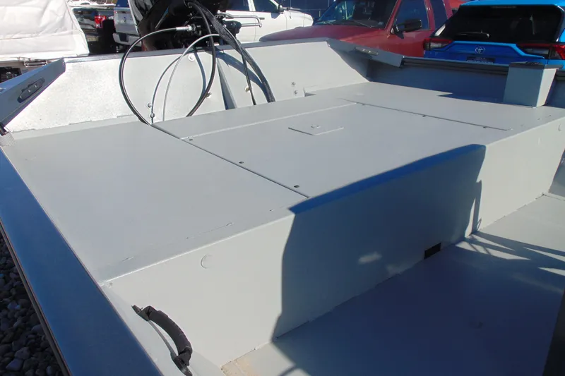 Slide: The Image of 2026 Crestliner 1870 Retriever FCC boat interior with storage compartments. - 7