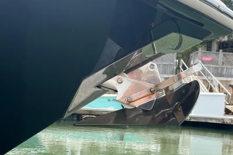Slide: The Image of 2015 Scout 275 Dorado boat interior with dual engines at marina. - 10