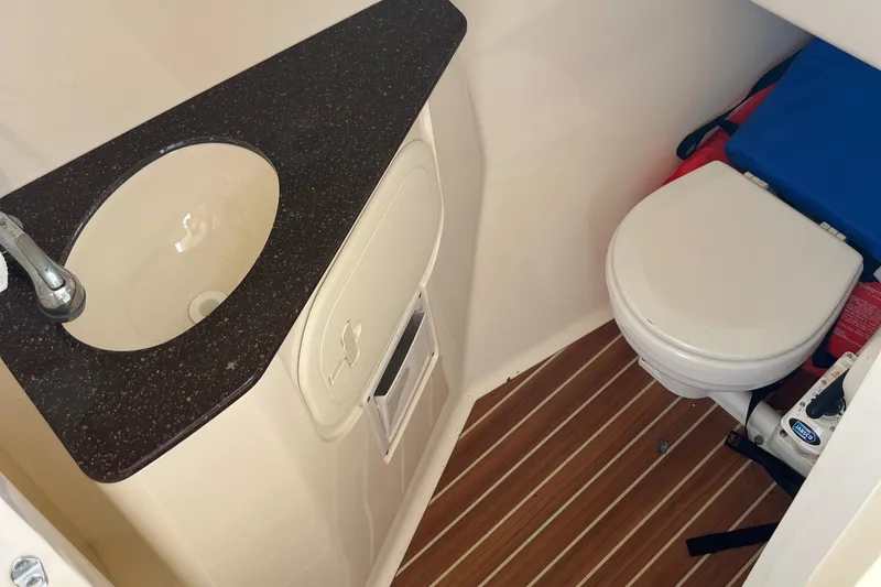 Slide: The Image of 2015 Scout 275 Dorado boat deck with twin 200 engines. - 24