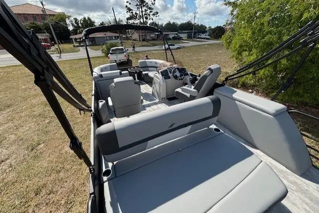 Slide: The Image of 2026 Starcraft EXS 3 Q DH boat with spacious seating and modern design. - 3