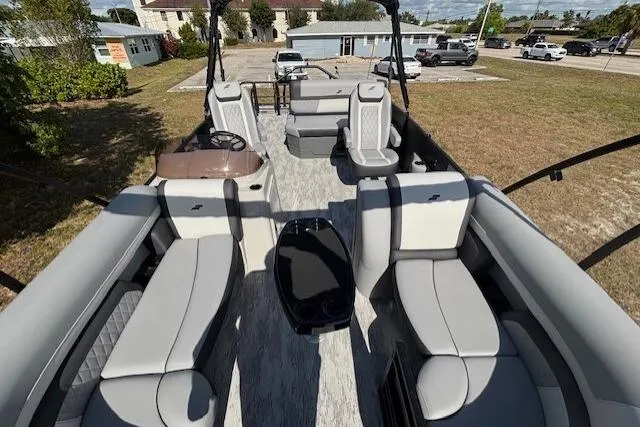 Slide: The Image of 2026 Starcraft EXS 3 Q DH pontoon boat with spacious seating and modern design. - 8