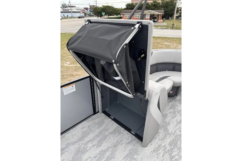 Slide: The Image of 2026 Starcraft SLS 3 Q DH pontoon boat with spacious seating and modern design. - 13