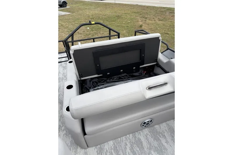 Slide: The Image of 2026 Starcraft SLS 3 Q DH boat interior with gray seating and central table. - 14