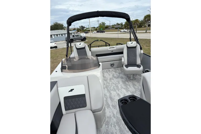 Slide: The Image of Captain's chair on 2026 Starcraft SLS 3 Q DH boat, featuring modern design and comfort. - 8