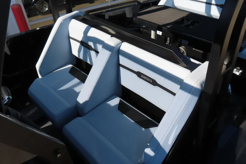 Slide: The Image of 2026 Iron 767 interior with modern white and black seating design. - 15