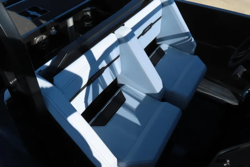 Slide: The Image of 2026 Iron 767 interior with modern design and sleek blue seats. - 21