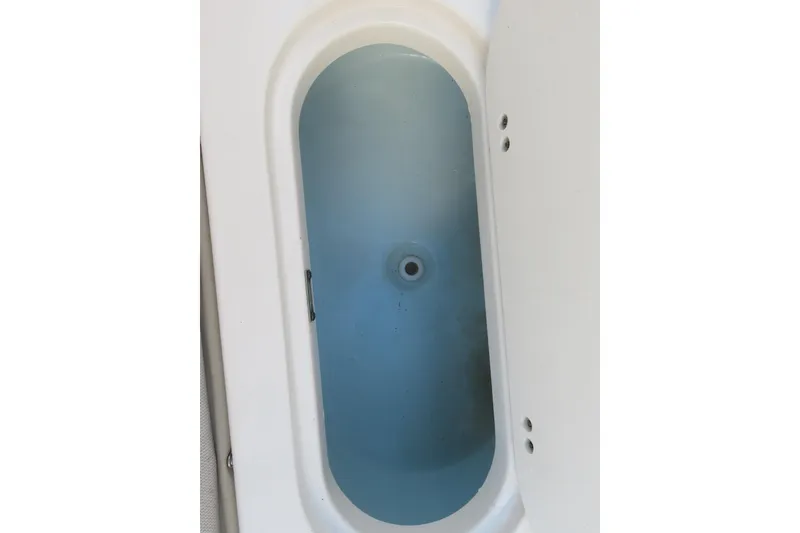 Slide: The Image of 2022 Key West 189 FS boat livewell interior view. - 25