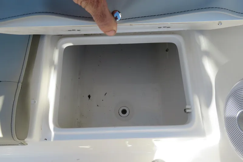 Slide: The Image of Open storage compartment on 2022 Key West 189 FS boat, showing interior space. - 26