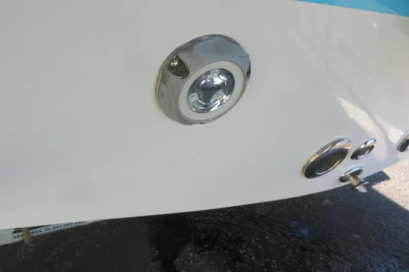 Slide: The Image of Close-up of a 2022 Key West 189 FS boat's rear light and fittings. - 39