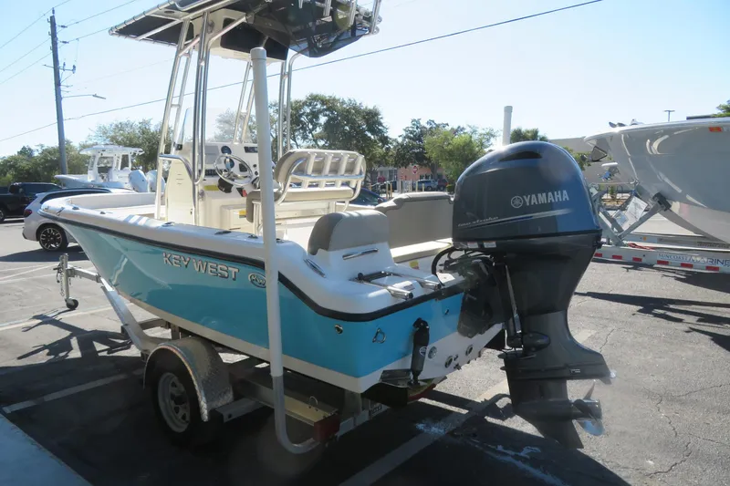 Slide: The Image of 2022 Key West 189 FS boat with Yamaha outboard motor on trailer. - 6