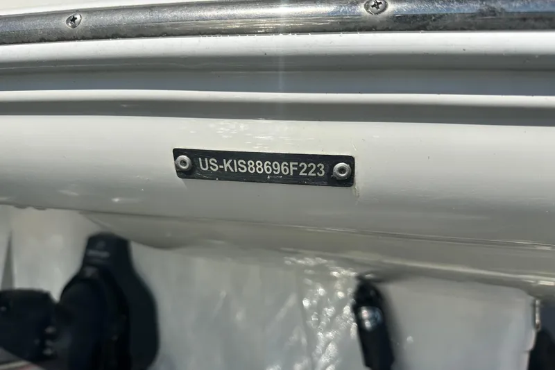 Slide: The Image of 2023 Crownline 290 CR boat hull identification number plate, US-KIS88696F223. - 60