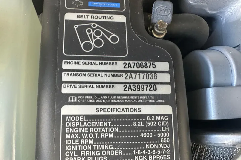 Slide: The Image of Engine specifications label on 2023 Crownline 290 CR boat, showing serial numbers and details. - 61