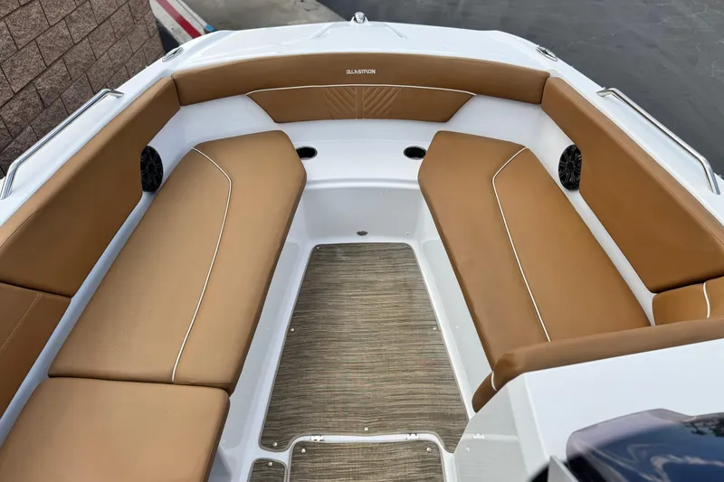 Slide: The Image of 2021 Glastron 205 boat interior with tan seating and modern design. - 11
