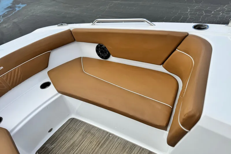Slide: The Image of 2021 Glastron 205 boat interior with tan leather seating and white accents. - 13