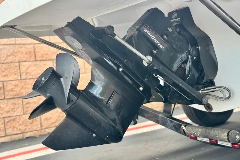 Slide: The Image of 2021 Glastron 205 boat with MerCruiser outboard motor, close-up view. - 7