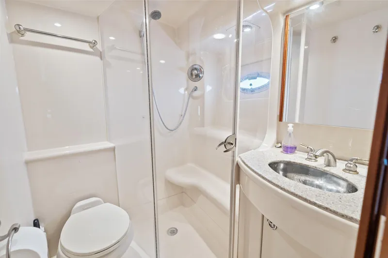 Slide: The Image of Luxurious bathroom in 2006 Meridian 411 Sedan yacht with shower and sink. - 28