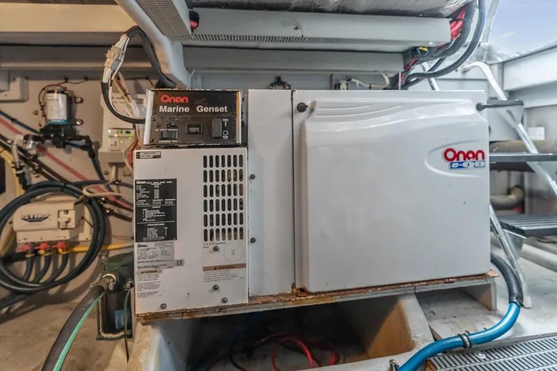 Slide: The Image of Engine room of 2006 Meridian 411 Sedan with Onan marine generator. - 30