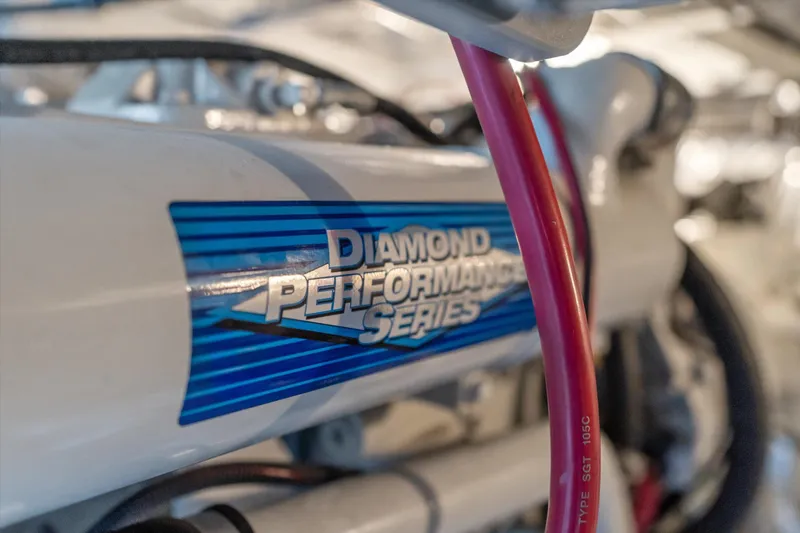 Slide: The Image of Close-up of a 2006 Meridian 411 Sedan engine with Diamond Performance Series label. - 33