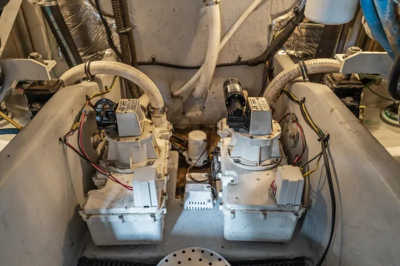 Slide: The Image of Engine room of a 2006 Meridian 411 Sedan with mechanical components and wiring. - 38