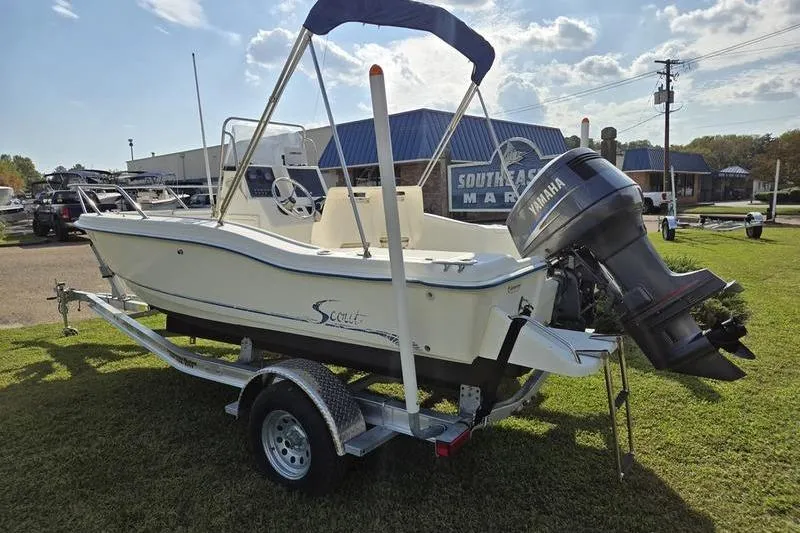 Slide: The Image of 2000 Scout 185 Sportfish boat on trailer with Yamaha outboard motor at South Texas Marine. - 4