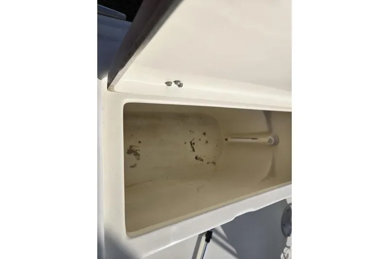 Slide: The Image of Open storage compartment on a 2000 Scout 185 Sportfish boat. - 6