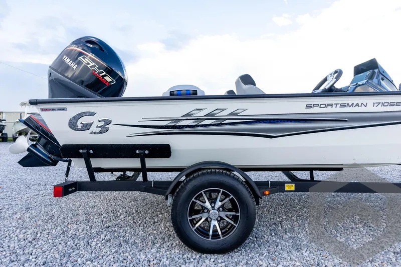 Slide: The Image of 2026 G3 Sportsman 1710 SE boat with Yamaha engine on a trailer. - 15