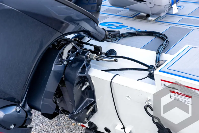 Slide: The Image of 2026 G3 Sportsman 1710 SE boat engine detail with wiring and branding. - 27