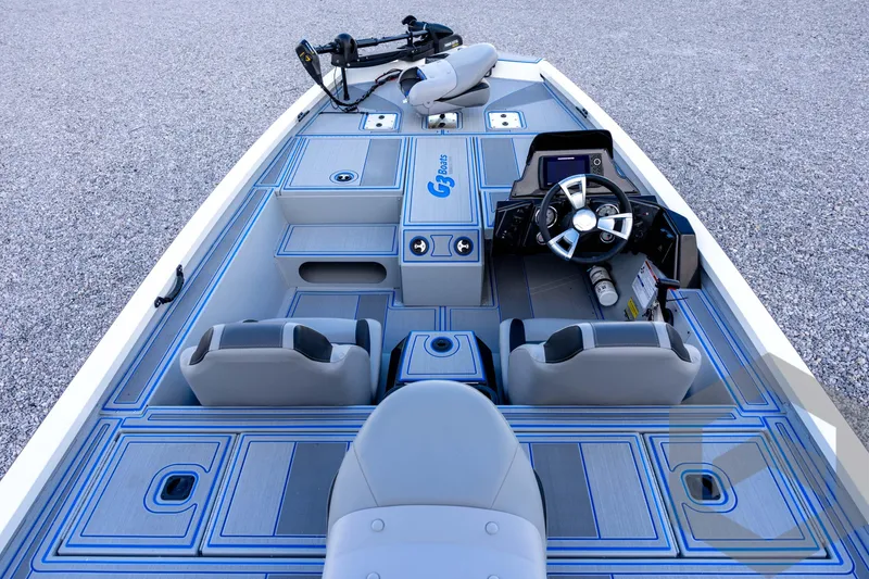 Slide: The Image of 2026 G3 Sportsman 1710 SE boat interior with modern seating and steering console. - 35