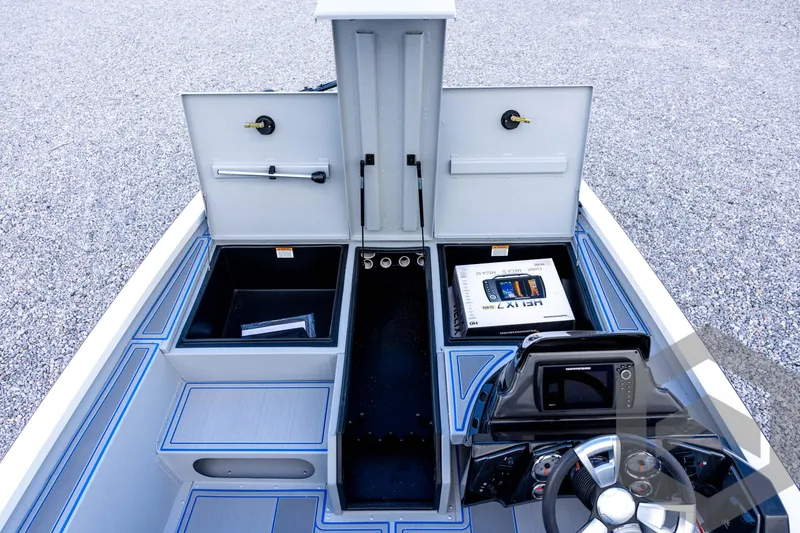 Slide: The Image of 2026 G3 Sportsman 1710 SE boat interior with storage compartments and control panel. - 43