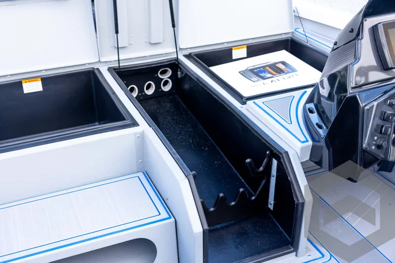 Slide: The Image of 2026 G3 Sportsman 1710 SE boat interior with storage compartments and control panel. - 45