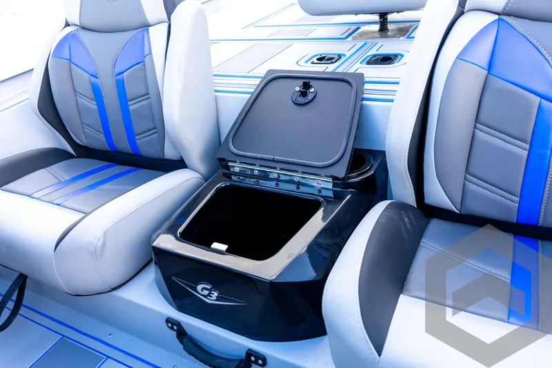 Slide: The Image of 2026 G3 Sportsman 1710 SE boat interior with open storage compartment and stylish seating. - 51