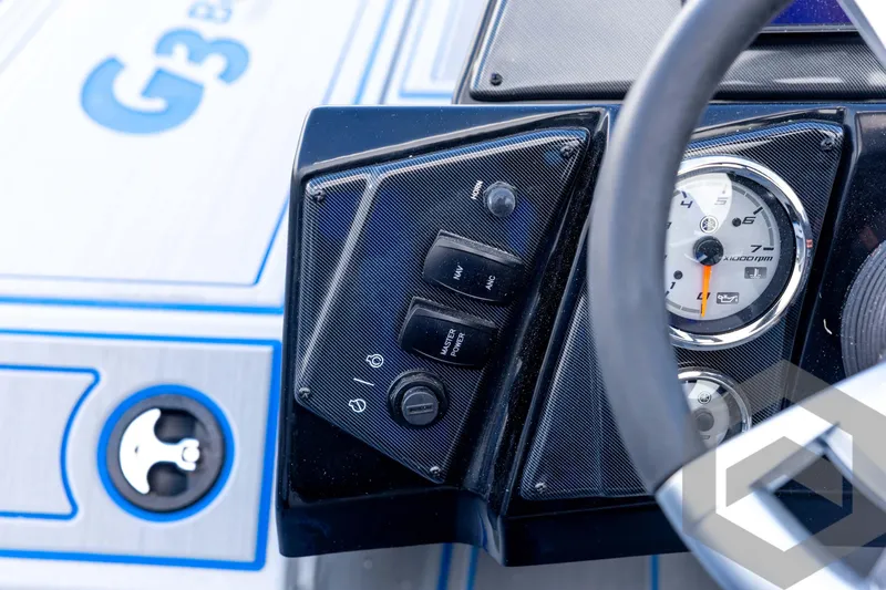 Slide: The Image of Dashboard of 2026 G3 Sportsman 1710 SE boat with steering wheel and gauges. - 53