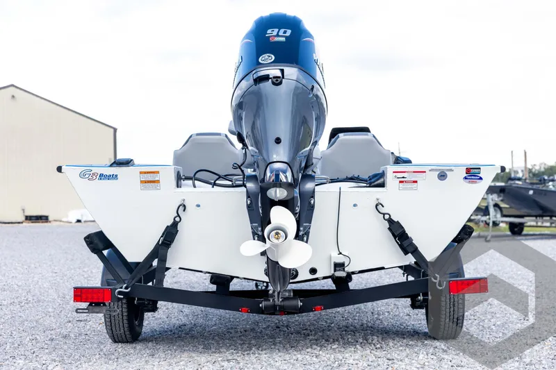 Slide: The Image of 2026 G3 Sportsman 1710 SE boat, rear view with motor and trailer. - 6