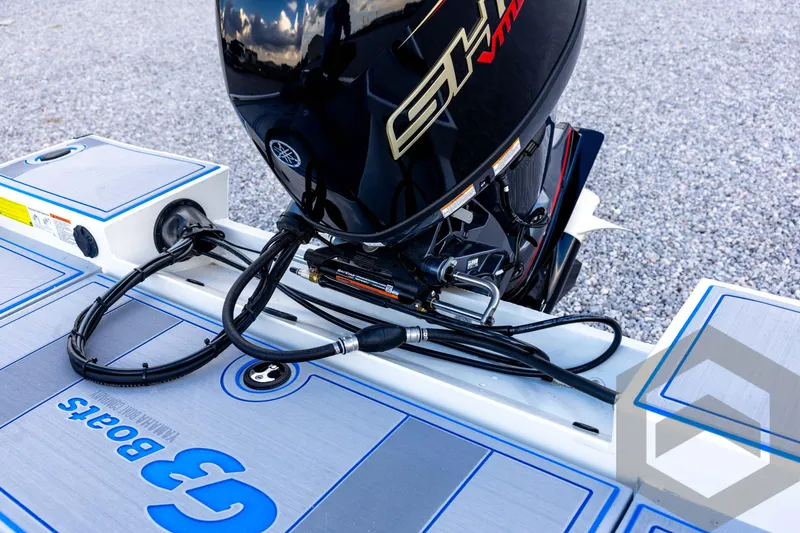 Slide: The Image of 2026 G3 Sportsman 1710 SE boat with Yamaha outboard motor on gravel. - 67