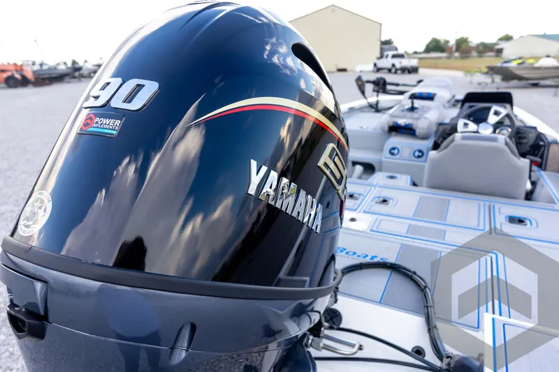 Slide: The Image of 2026 G3 Sportsman 1710 SE boat with Yamaha 90 engine, parked outdoors. - 69