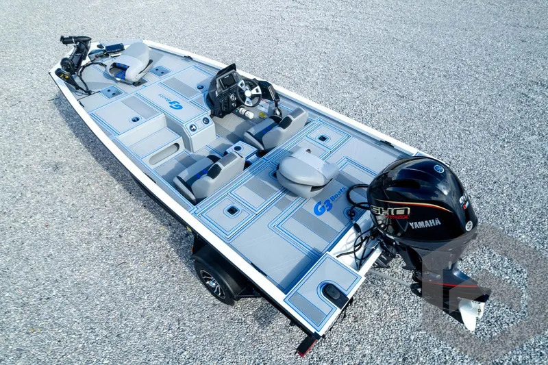 Slide: The Image of 2026 G3 Sportsman 1710 SE boat with Yamaha engine on gravel surface. - 73