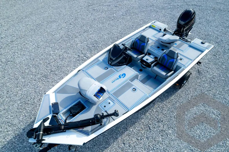 Slide: The Image of 2026 G3 Sportsman 1710 SE fishing boat on gravel, featuring modern seating and equipment. - 75