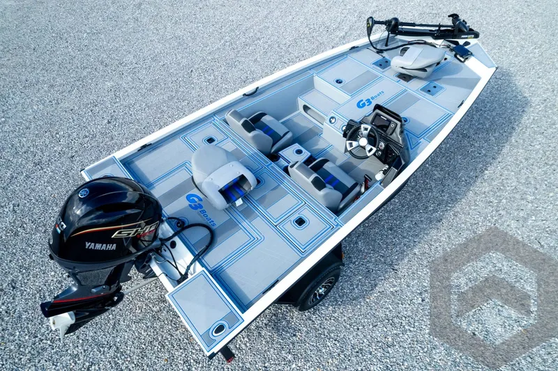 Slide: The Image of 2026 G3 Sportsman 1710 SE boat with Yamaha engine on gravel surface. - 79