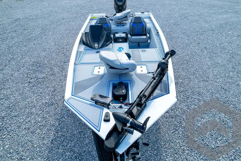 Slide: The Image of 2026 G3 Sportsman 1710 SE boat with modern seating and equipment on gravel surface. - 81