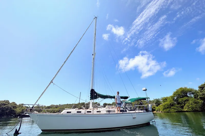 The Image of 1984 Sabre MK 1 sailboat on calm water with clear blue sky. - 0