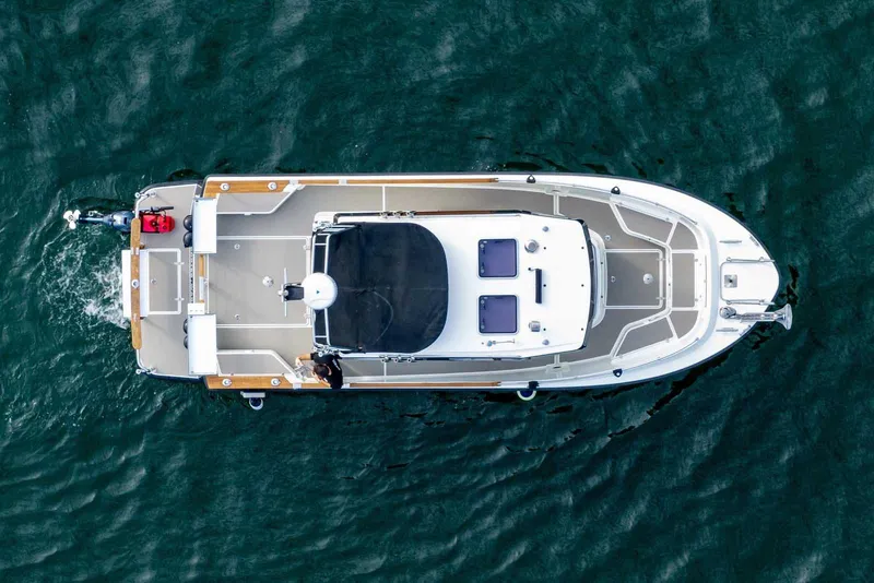 Slide: The Image of Overhead view of 2019 Targa 27.2 boat on water. - 3