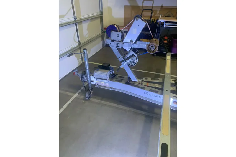 Slide: The Image of Trailer hitch and equipment in a garage, Corsair 31 UC, 2001 model. - 14
