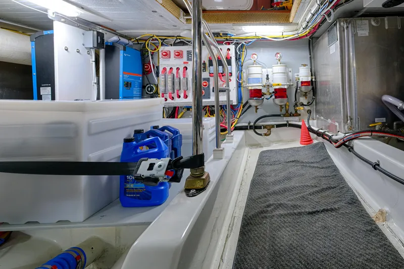 Slide: The Image of Engine room of 2007 American Tug 41 with equipment and wiring. - 21